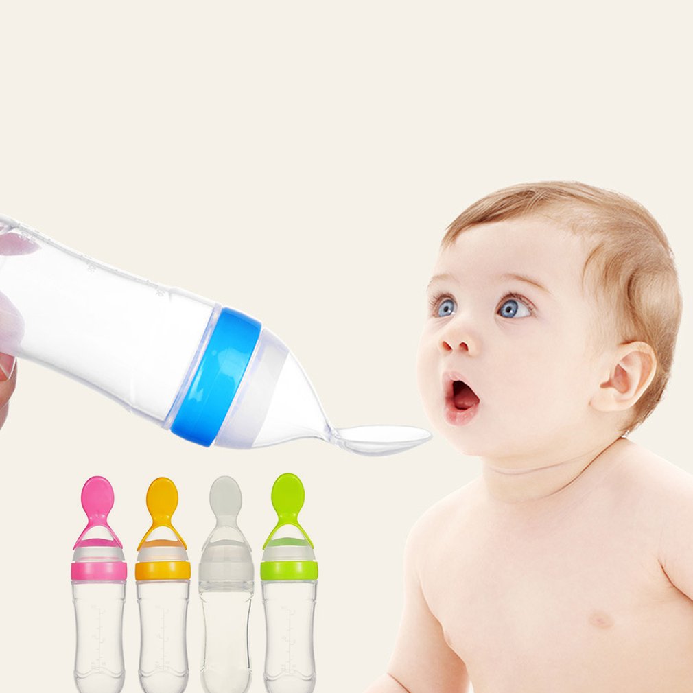 Baby Squeezing Feeding Bottle With Spoon